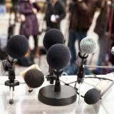 Microphones at a news conference